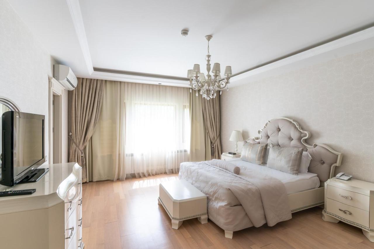 Qafqaz Riverside Hotel Gabala Buitenkant foto A bedroom