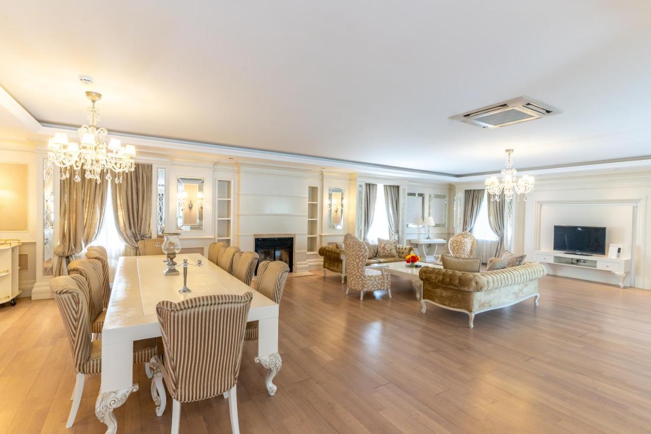 Qafqaz Riverside Hotel Gabala Buitenkant foto A living room in a luxury apartment