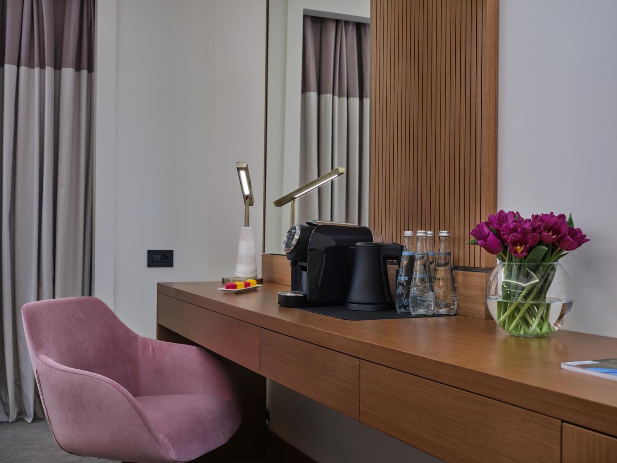 Qafqaz Riverside Hotel Gabala Buitenkant foto A Nespresso machine in a hotel room