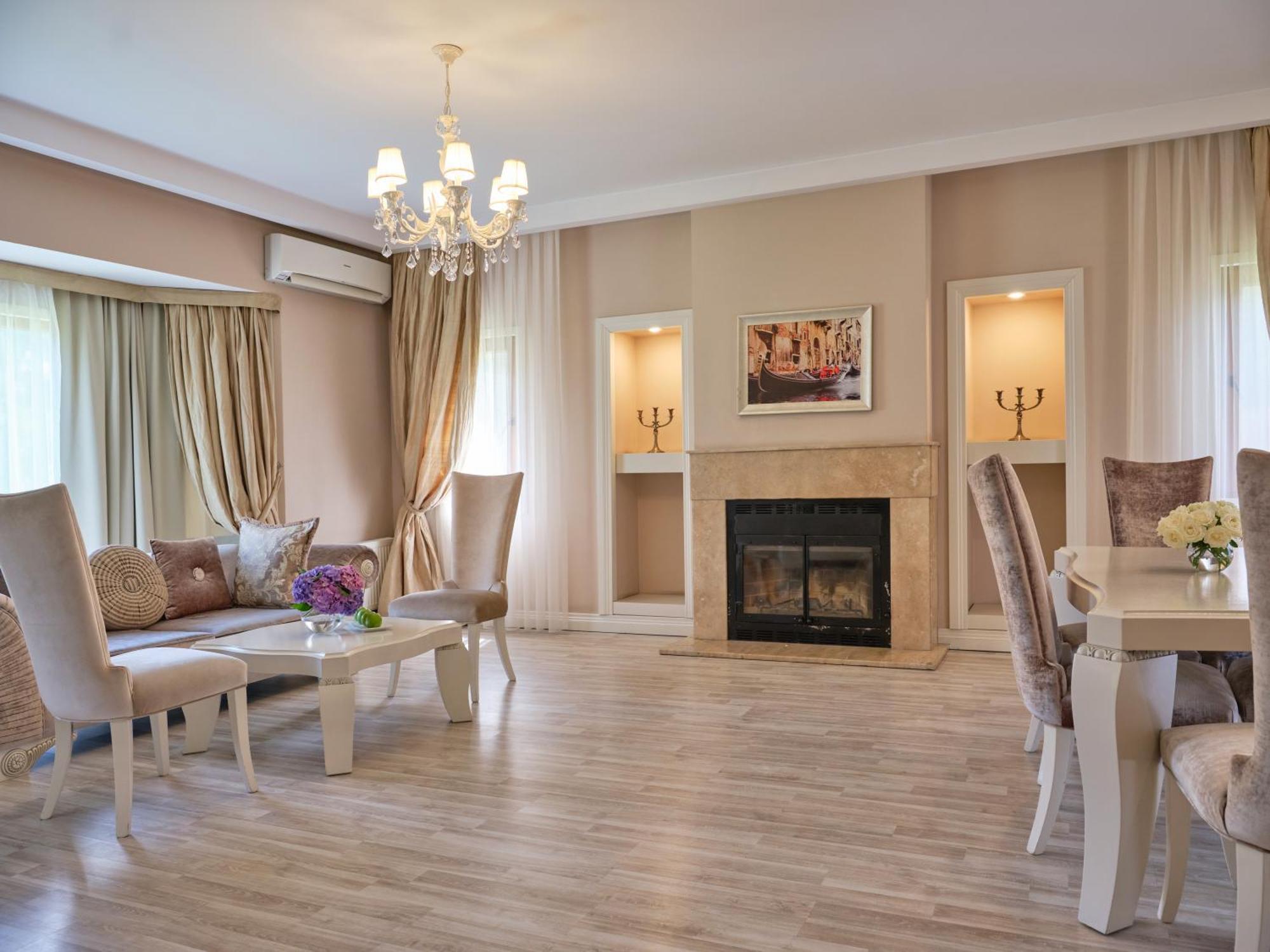 Qafqaz Riverside Hotel Gabala Buitenkant foto A living room in a modern apartment