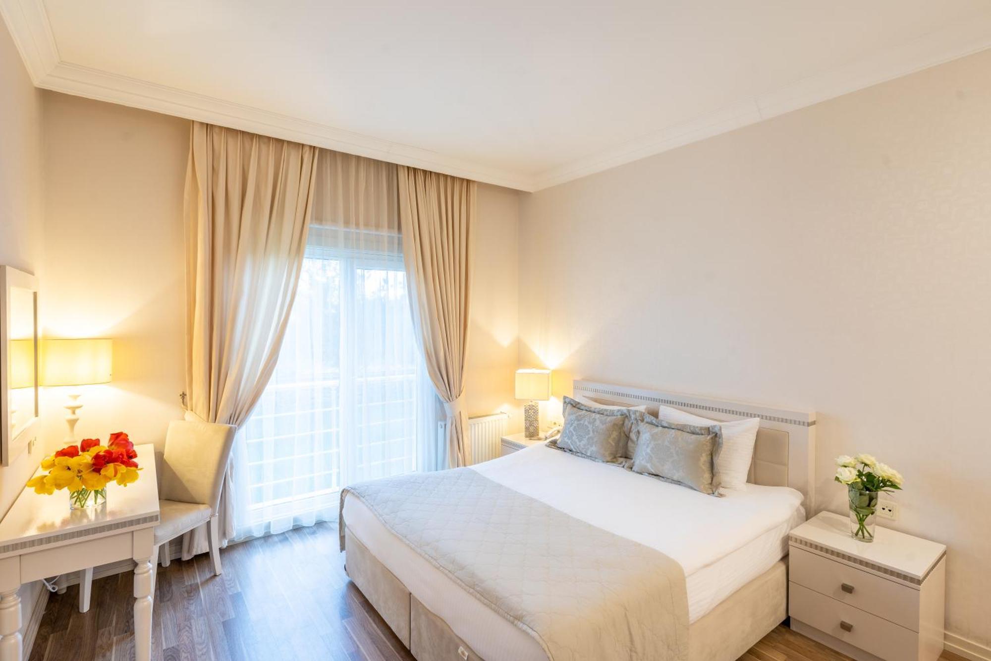 Qafqaz Riverside Hotel Gabala Buitenkant foto A bedroom at the hotel