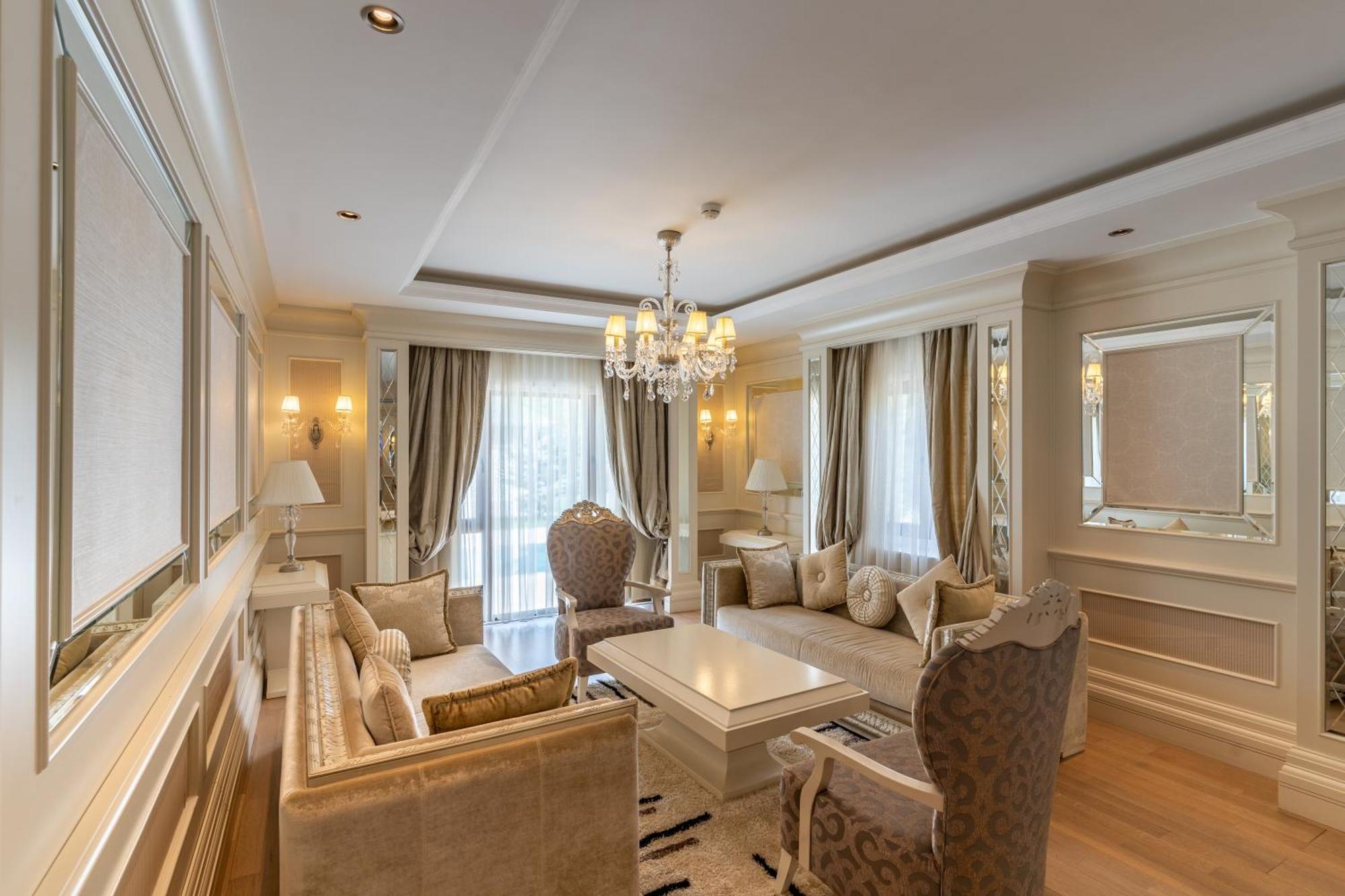 Qafqaz Riverside Hotel Gabala Buitenkant foto A living room in the hotel