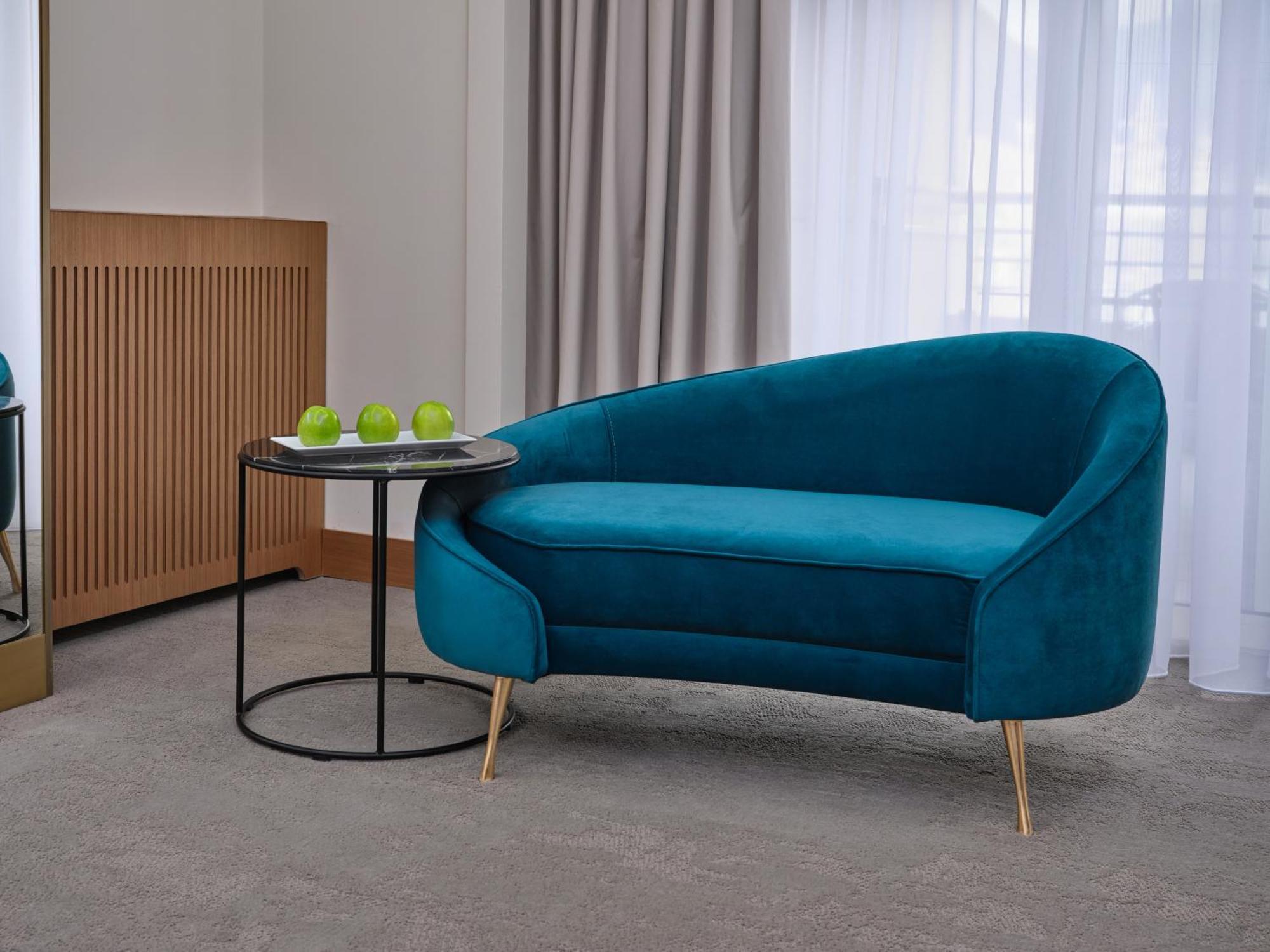 Qafqaz Riverside Hotel Gabala Buitenkant foto A sofa