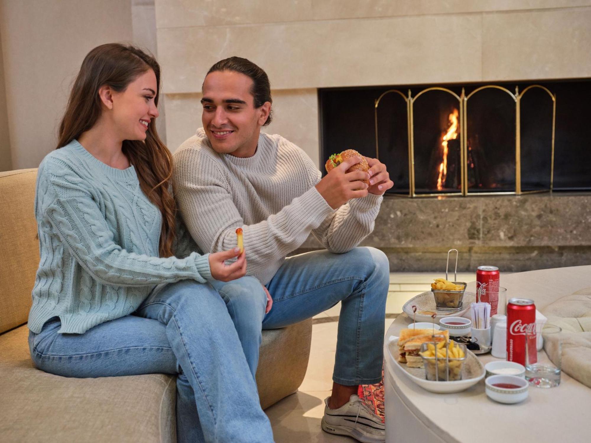 Qafqaz Riverside Hotel Gabala Buitenkant foto A couple enjoying a relaxing moment at the spa