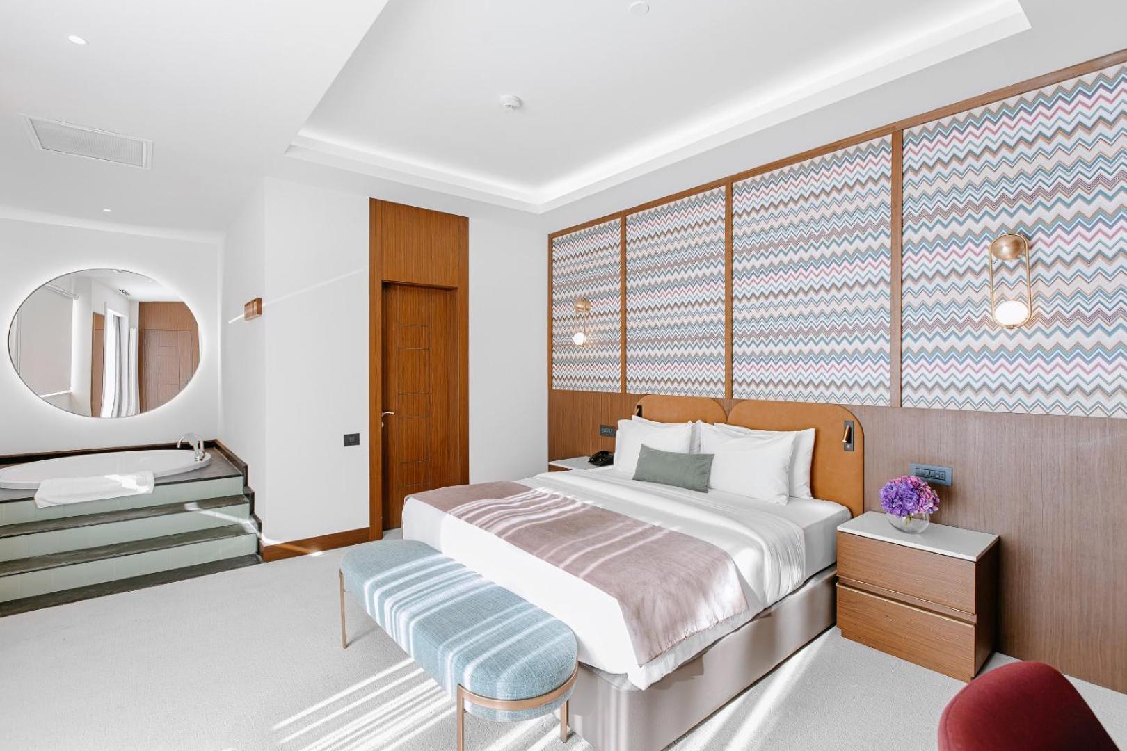 Qafqaz Riverside Hotel Gabala Buitenkant foto A bedroom at the hotel