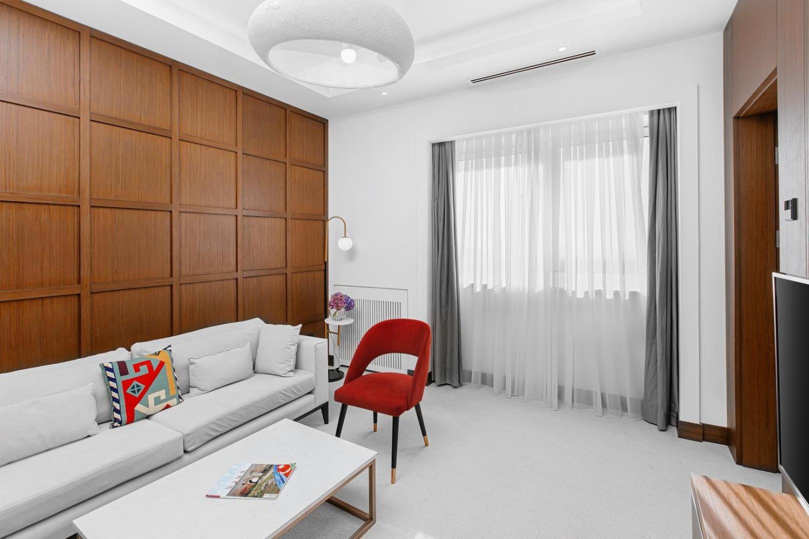 Qafqaz Riverside Hotel Gabala Buitenkant foto A room at the hotel