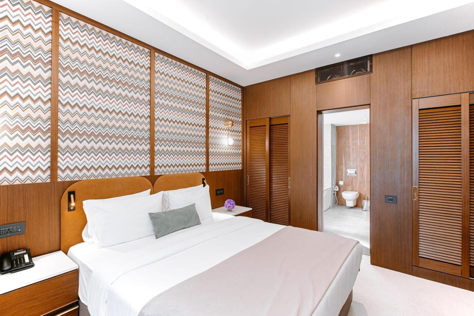 Qafqaz Riverside Hotel Gabala Buitenkant foto A bedroom at the hotel